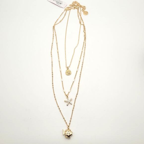 Lilly Pulitzer Jewelry - Lilly Pulitzer Gold Layered Necklace Sea Life Charms Starfish Pufferfish Pendant